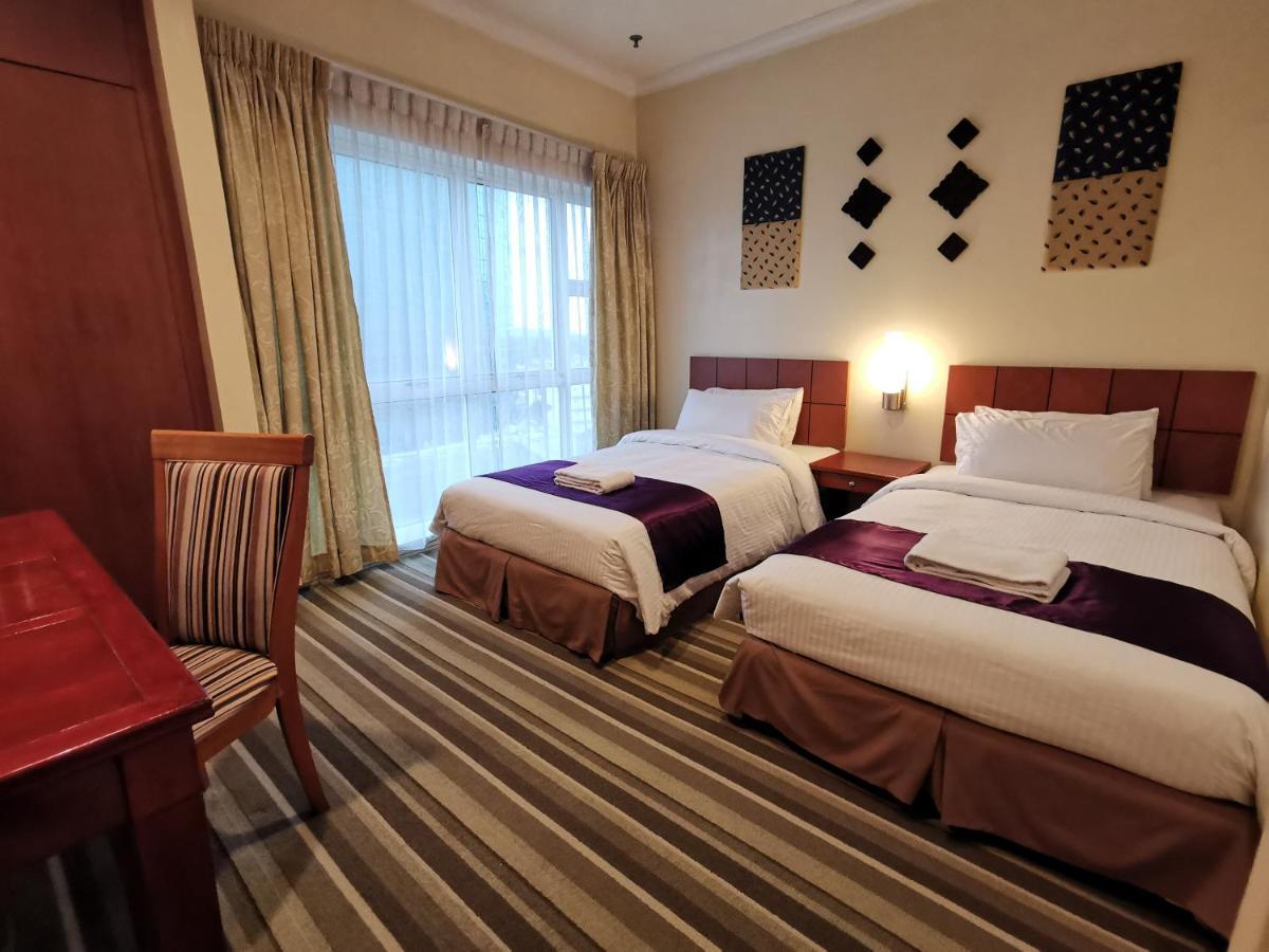 Stayinn Gateway Hotel Apartment Kuching Exterior photo